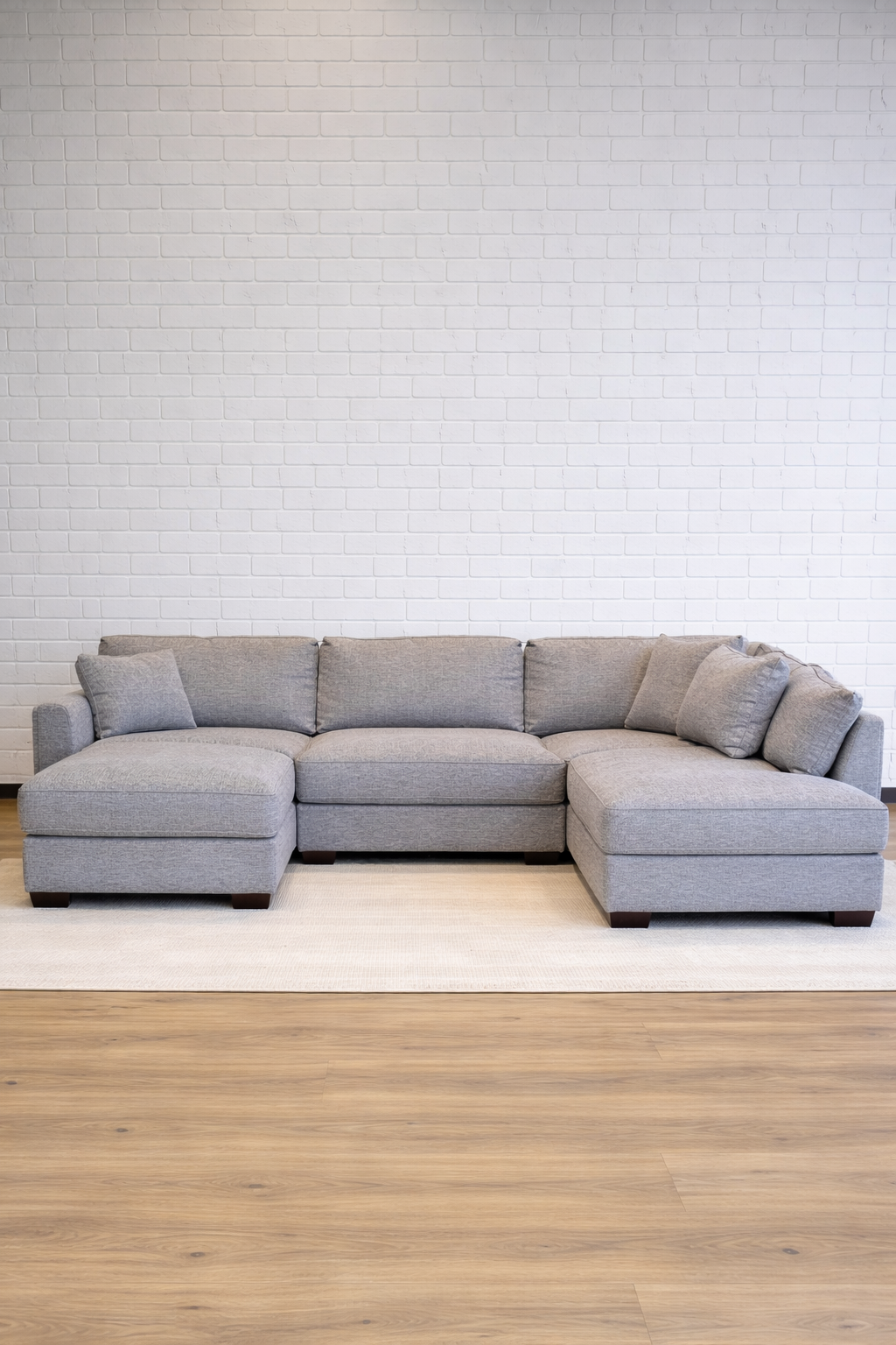 Gray 2 Piece Sectional Couch With Ottoman